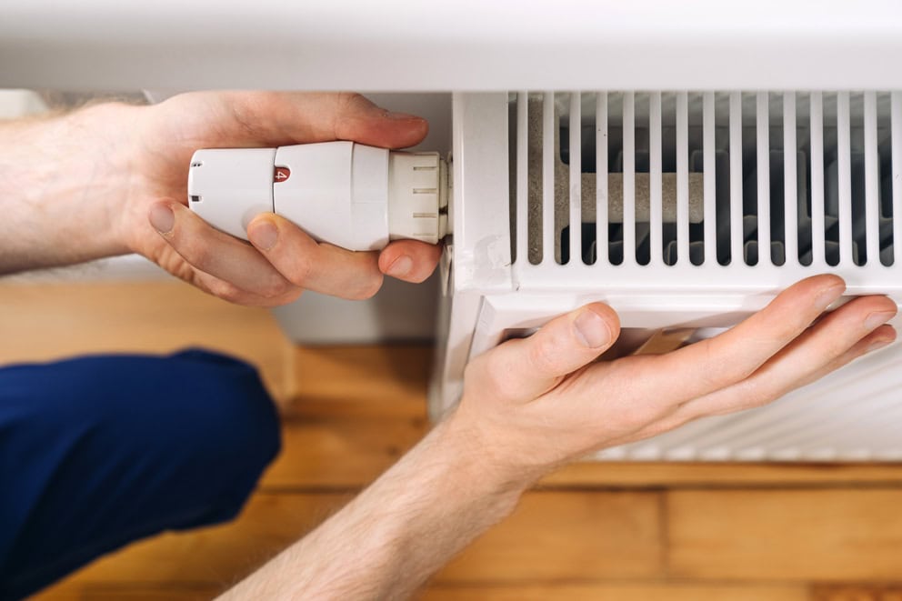Why Your Radiators Are Cold at the Bottom (And How to Fix It)